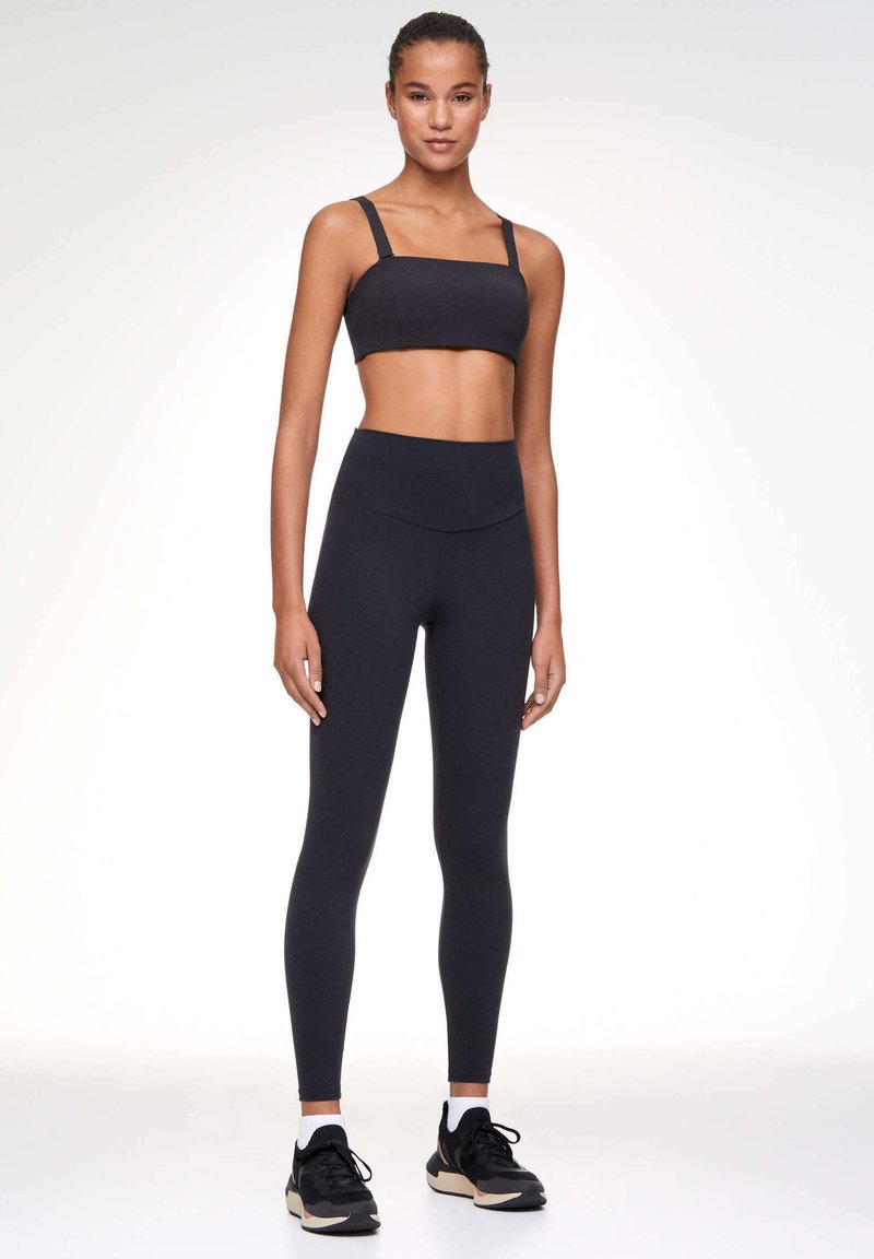 OYSHO Medium support sports bra black Zalando.ie