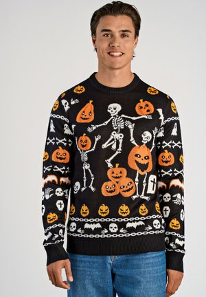 Black knit sweater featuring multicolored Halloween-themed designs, including skeletons, pumpkins, and skulls, with ribbed cuffs and hem.