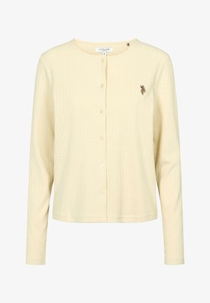 Cremefarbener, gerippter Langarm-Cardigan mit Knopfleiste, Rundhalsausschnitt und kleinem, gesticktem U.S. Polo Assn. Logo auf der linken Brust.