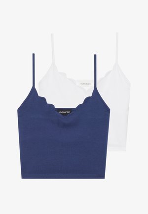 Set di bralette in cotone navy e bianco con scollo a scallop, spalline sottili e design aderente. Etichetta con logo sul lato interno del pezzo navy.
