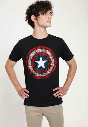 Black cotton t-shirt featuring a large red, white, and blue Captain America shield graphic with comic strip details in the background.