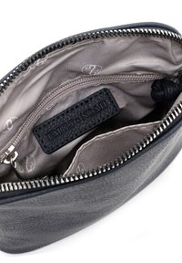 Black textured leather pouch with silver zipper, beige fabric interior, zippered inner pocket, and "EMILY & NOAH" leather brand label.