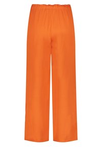 Pantalons orange à jambes larges avec une taille élastique, fabriqués en tissu léger. Le design présente une texture lisse sans motifs ni accents visibles.