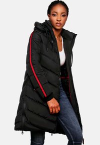 Black puffer coat with quilted design, red stripes along the sleeves, zippered pockets, and a hood. Made of smooth, insulated material.
