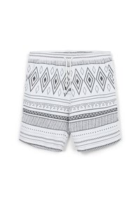 Shorts blancs avec des motifs géométriques en losanges et rayures noires, dotés d'une taille élastique et d'un cordon de serrage à l'avant.