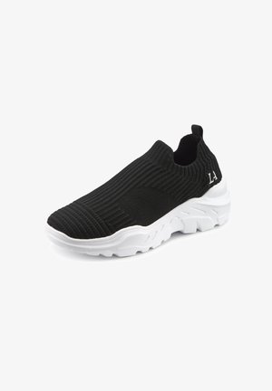 Black slip-on knitted athletic shoe with white chunky sole and pull tab at heel, featuring "LA" text on side.