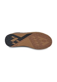 Suola della scarpa con una combinazione di gomma nera e marrone, caratterizzata da una superficie testurizzata e un motivo geometrico per garantire aderenza.