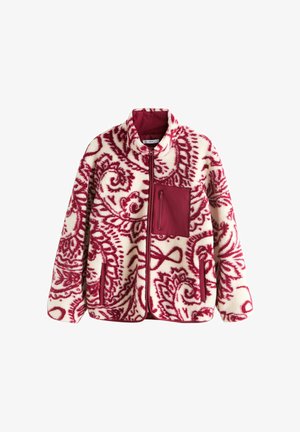 Veste en polaire avec une base crème et un motif paisley rouge, dotée d'un col montant, d'une poche poitrine zippée et de deux poches latérales.