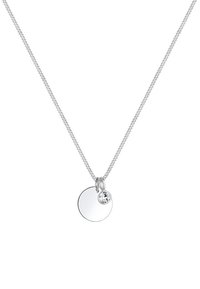 Silver necklace with a fine chain, featuring a circular pendant and a small attached crystal accent. Smooth surface with reflective finish.