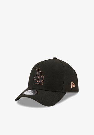 Black baseball cap with a structured design, featuring a raised LA logo in rose gold embroidery on the front and a curved visor.