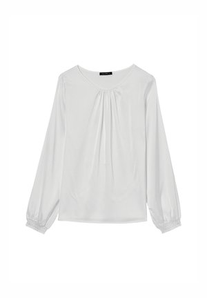 Camicia bianca a maniche lunghe con scollatura rotonda, caratterizzata da dettagli arricciati sul petto e polsini elasticizzati per una vestibilità comoda. Texture liscia.