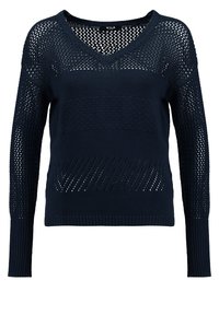 Tmavě modrý pletený svetr s výstřihem do V, dlouhými rukávy, vzorem s průstřihy a žebrovaným lemem. Textura s různými vzory stehů.