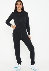 LEGEA Trainingsbroek - nero