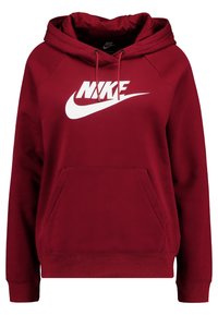 Röd hoodie i mjukt tyg med en kanguru-ficka framtill, dragsko i huvan och en stor vit Nike-logotyp på bröstet.