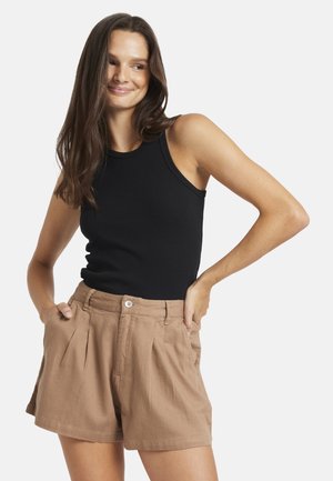 Black ribbed tank top paired with light brown pleated shorts featuring front pockets and a button closure, displayed against a white background.