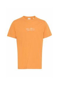 Orange bomulds T-shirt med korte ærmer. Forskellige hvide tekst "Très Bien au bord de la mer d'Azur" trykt på fronten. Rund halsudskæring.