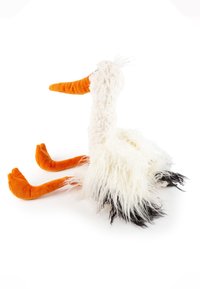 Plüschreiher-Spielzeug mit einem weißen, flauschigen Körper, orangefarbenem Schnabel und Beinen sowie schwarzen Schwanzfedern. Hat freundliche, gestickte Augen und eine weiche Textur.