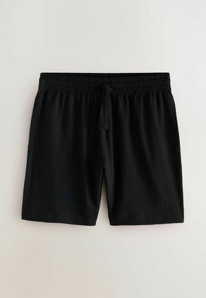 Kerged mustad lühikesed püksid, mis on valmistatud kerge kangaga, elastse vöökoha ja paelaga. Omavad küljetaskuid ja siledat tekstuuri.