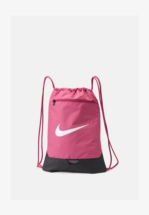 Mochila de cuerdas rosa con un logo blanco de Nike, hecha de tela ligera, con un panel inferior negro y un bolsillo frontal con cremallera.