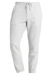 Lichtgrijze corduroy joggingsbroeken met elastische tailleband, trekkoord, zijzakken en elastische boorden bij de enkels.
