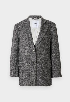 Black and white herringbone patterned blazer with two buttons, notched lapels, flap pockets, and light gray inner lining.