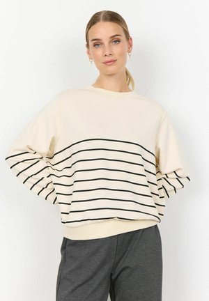 Sweatshirt beige avec des rayures horizontales noires, doté d'un col ras du cou et d'une coupe ample. Texture douce et poignets et ourlet côtelés.