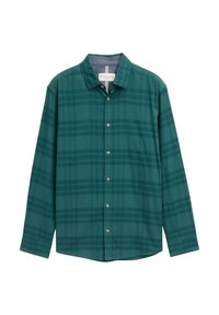 Groene geruite blouse met lange mouwen van geweven stof. Heeft een opknopen aan de voorkant, een kraag en een geborduurd logo op de borst.