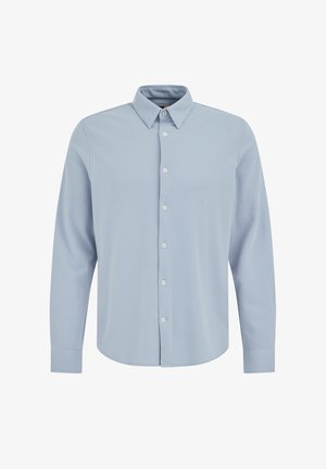 Vaaleansininen pitkähiha paita, joka on valmistettu teksturoidusta kankaasta ja jossa on perinteinen kaulus sekä valkoiset napit etukappaleen nappilistalla.