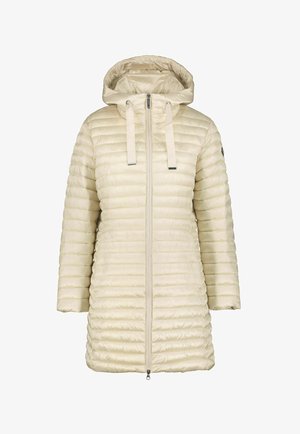 Gevoerde crèmekleurige jas met capuchon, voorzien van een volledige rits, trekkoordaccenten en een horizontaal quiltpatroon. Soepele, lichte stof.