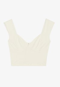 Cropped top i creme, lavet af blødt stof. Har brede stropper, en V-halsudskæring og et tætsiddende design med syning detaljer.