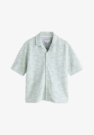 Chemise à manches courtes boutonnée vert clair avec un motif abstrait ondulé et un col décontracté, taille moyenne.