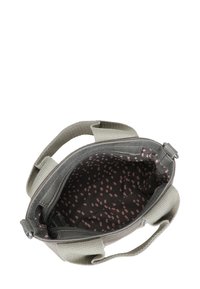 Borsa in tessuto grigio con un'esterno testurizzato e una fodera interna scura a motivo con pois rosa. Ha manici corti e robusti.