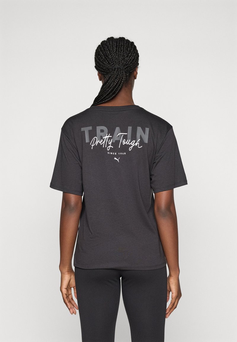 Puma PRETTY TOUGH GRAPHIC TEE - Sportovní tričko - black