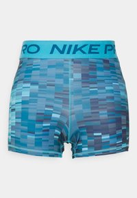 Shorts Nike Pro bleus avec un motif géométrique texturé, présentant une large ceinture élastique bleu clair avec le logo "NIKE PRO".