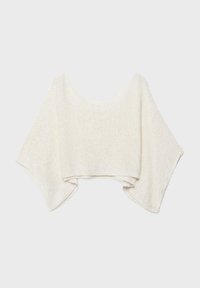 Poncho lavorato a maglia color crema con maniche larghe e vestibilità ampia e aperta, disteso su uno sfondo neutro.