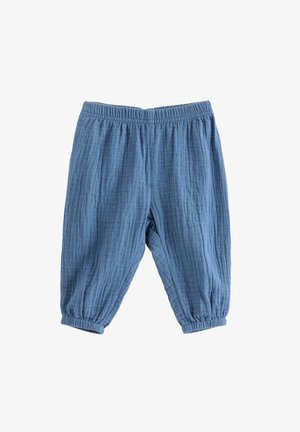 Bløde blå bukser til småbørn med elastik i taljen og ved anklerne, lavet af tekstureret og åndbart stof.