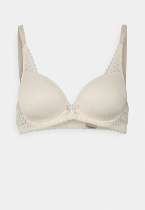 Beige polstret bh med et struktureret mønster, detaljer i blonde på båndet og stropperne, samt en glat overflade på kopperne.