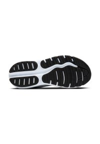 Semelle de sneaker noire en caoutchouc avec des accents blancs, présentant des motifs texturés pour l'adhérence et la flexibilité. Design ergonomique pour le confort.