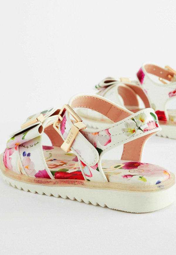 FLORAL PATENT  REGULAR FIT – Lauflernschuh