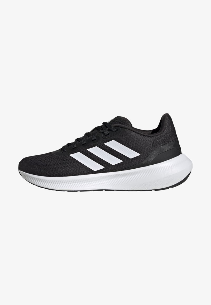 Zapatilla de running negra de Adidas con tres franjas blancas en el lateral y una suela gruesa blanca, mostrada desde el lado exterior.