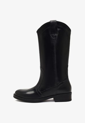 - Kowbojki i obuwie motocyklowe