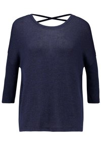 Marinblus som är löst sittande och tillverkad av ett lätt, texturerat tyg. Har en rundad halsringning och korskorsning på baksidan.