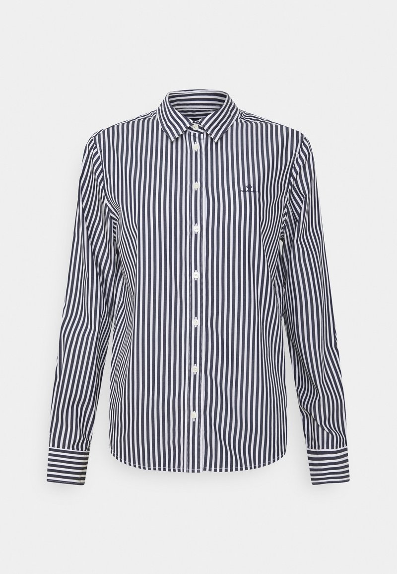 Chemise à manches longues boutonnée avec des rayures verticales noires et blanches et un petit logo brodé sur la poitrine gauche.