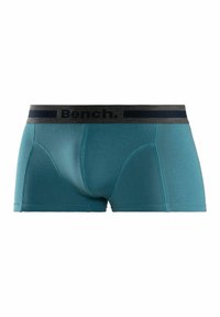 Boxer briefs in misto cotone verde acqua con una cintura elastica grigio scuro recante il logo "Bench." Texture liscia, design aderente con cuciture.