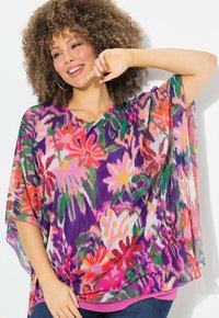 Kaftan floreale multicolore con scollatura a V, vestibilità ampia e tessuto trasparente. Motivi vivaci in rosa, verde e viola. Accentuato da uno strato inferiore rosa solido.
