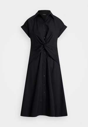 Robe noire avec col, manches courtes et détail de nœud à la taille. Dotée d'un devant à bouton et d'une jupe ample.