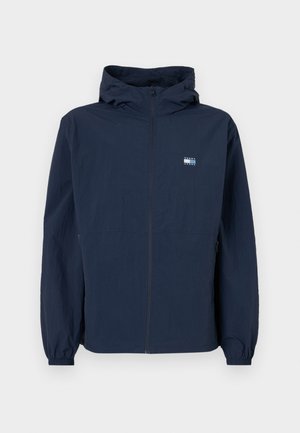 Tommy Jeans CHICAGO WINDBREAKER - Summer jacket - dark night navy