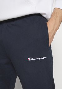 Champion CLASSIC STRAIGHT HEM PANTS - Treningo apatinė dalis - dark blue