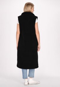 Schmuddelwedda Mellény - schwarz