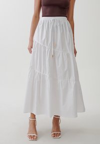 TUSSAH MEG  - Gonna a campana - white
